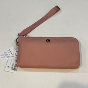 Lululemon Athletica Blush Curved Wristlet Clutch. NWT